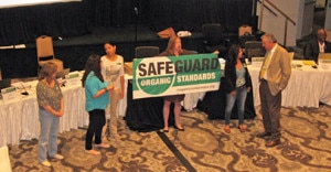 Members of the Organic Consumers Association held a protest at the recent National Organic Standards Board meeting in San Antonio, TX. photo via Food Safety News